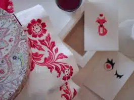 white and red floral textile