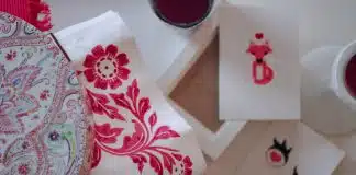 white and red floral textile